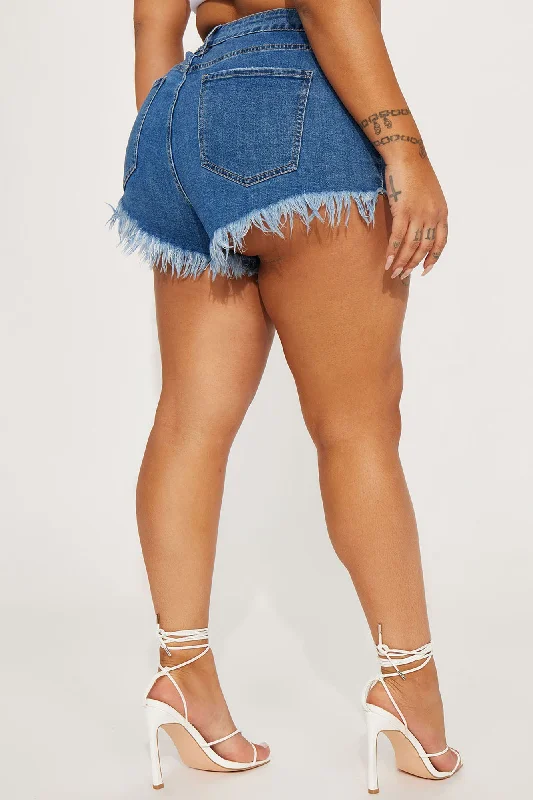 beach-party-cheeky-cut-off-denim-shorts-medium-wash