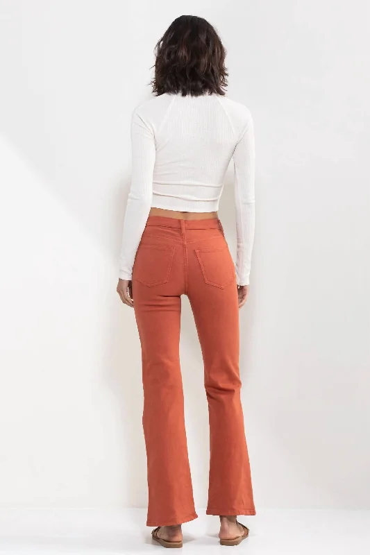 high-rise-solid-slim-bootcut-jeans-in-rust